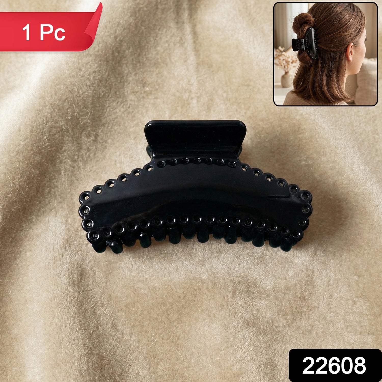 Black hair claw clip shown on a clean background