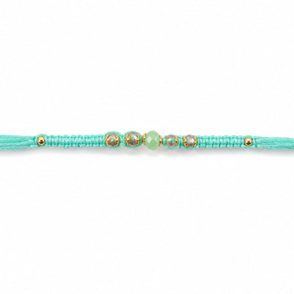 Beautiful Pearl and Stone Rakhi with Bright Beads and Elegant Raksha Bandhan Look
