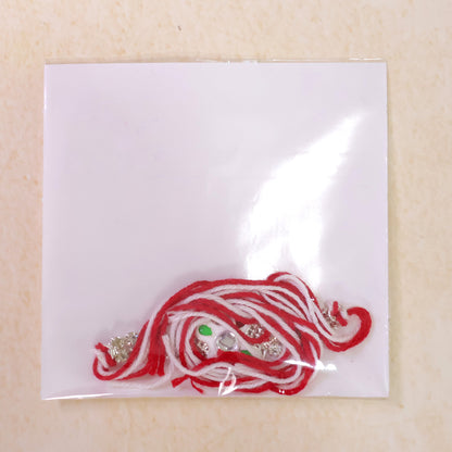 Festive Rakhi featuring Floral Circle Charm, pearl accents and chain look for Gifting