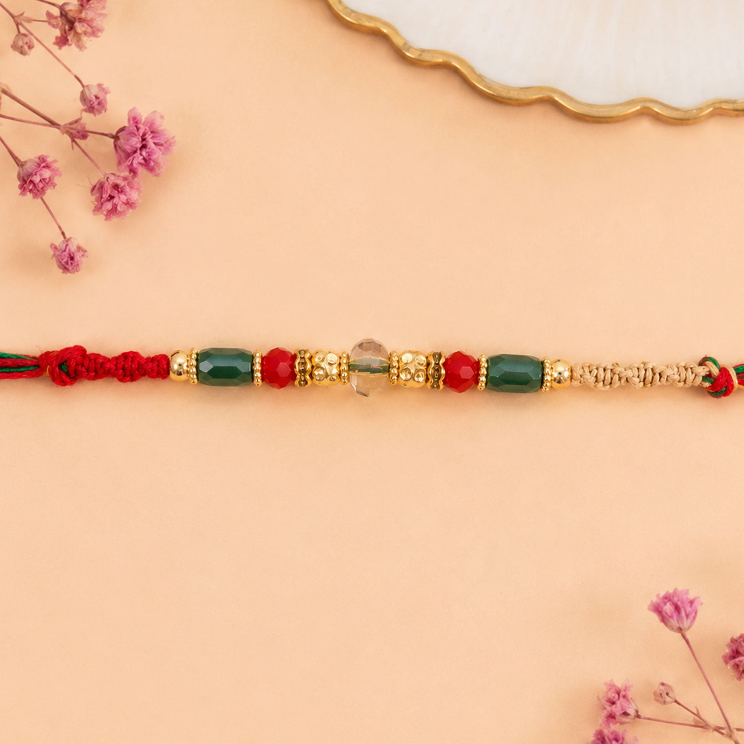 Beautiful Pearl Bead Rakhi with Soft Festive Shades and Elegant Designer Look