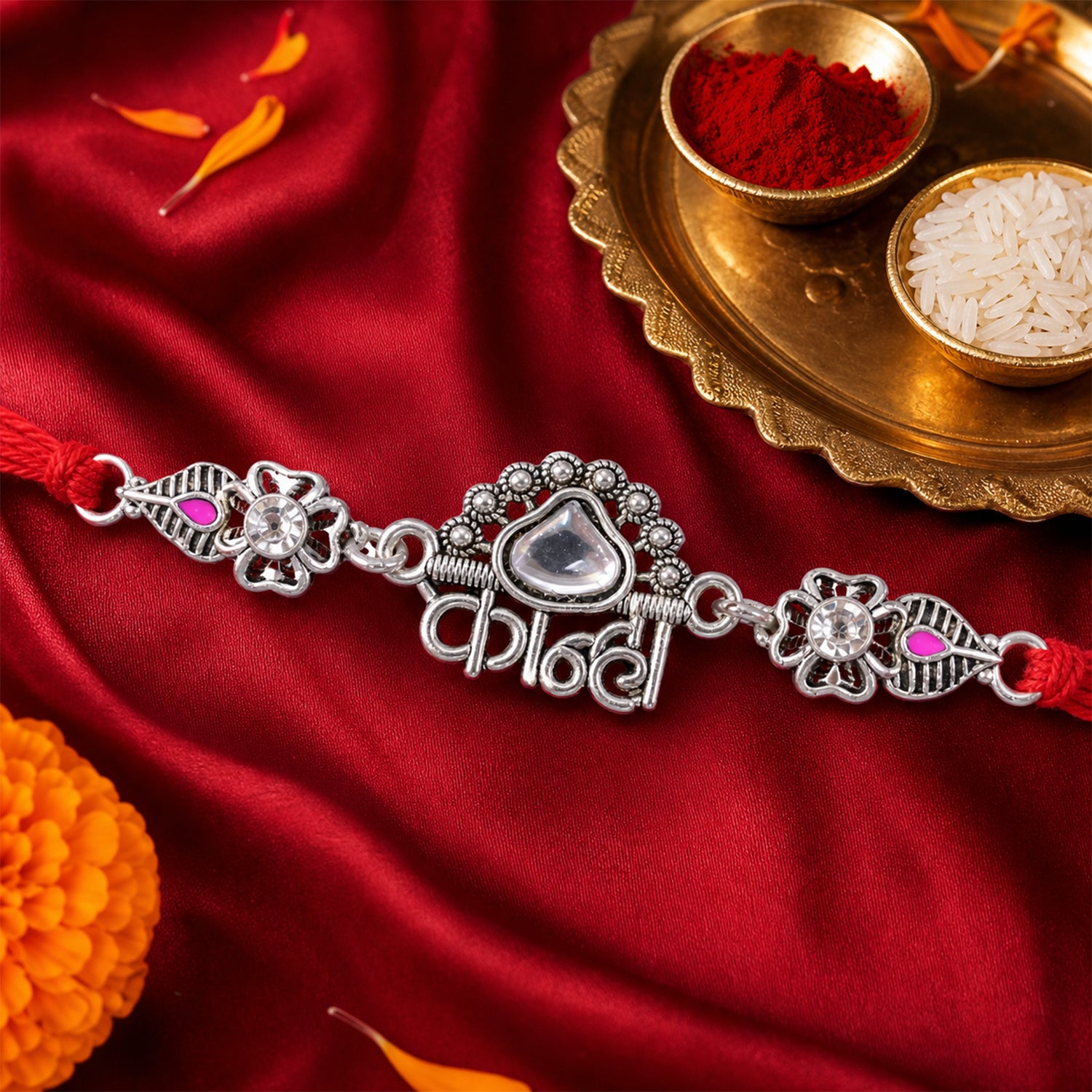 Silver-Toned Kanha Rakhi with Kundan-Style Stone, Crystal Accents & Designer Red Thread