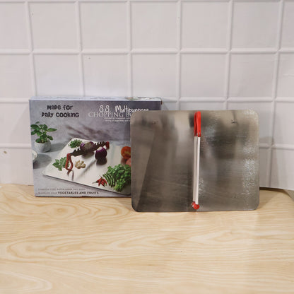 Stainless steel multipurpose chopping board with knife, ideal for clean and efficient kitchen prep.