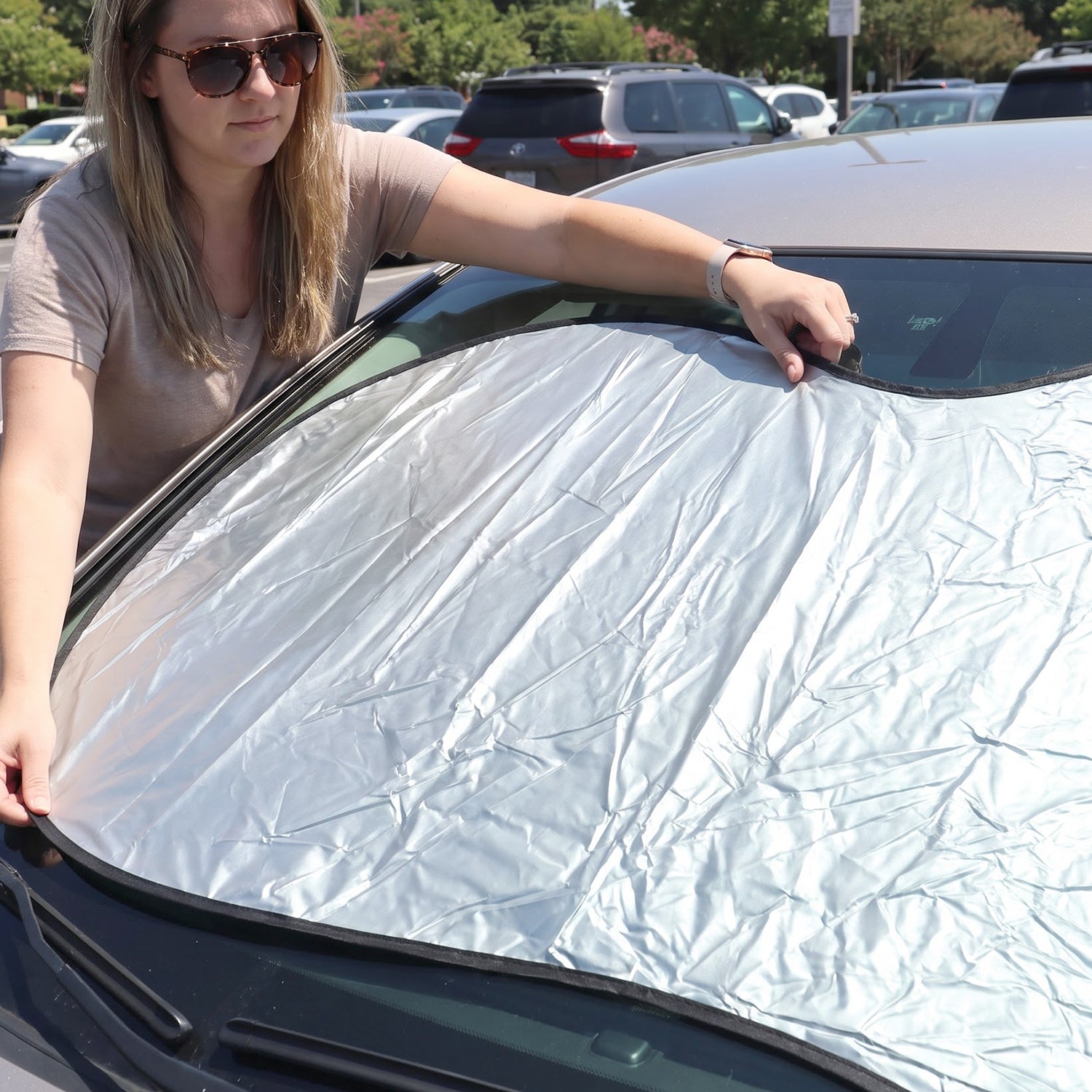 Car windshield sunshade in use