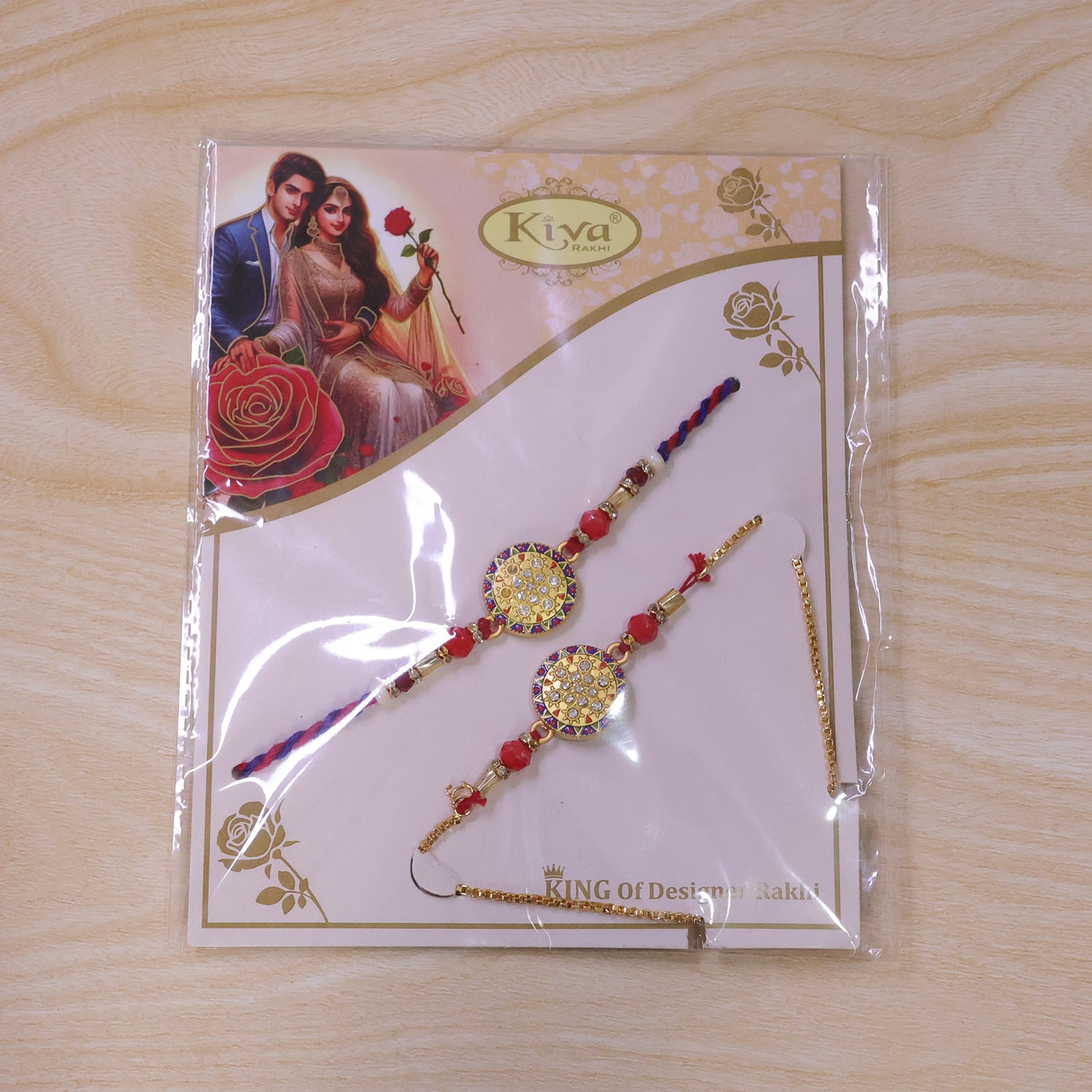 Stone Studded Round Bhai Bhabhi Lumba Rakhi with Pearl Hangings