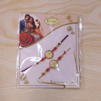 Stone Studded Round Bhai Bhabhi Lumba Rakhi with Pearl Hangings
