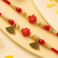 Bhai Bhabhi Floral Charm Rakhi Set with Red Thread, Gold Beads and Black Fan Drops