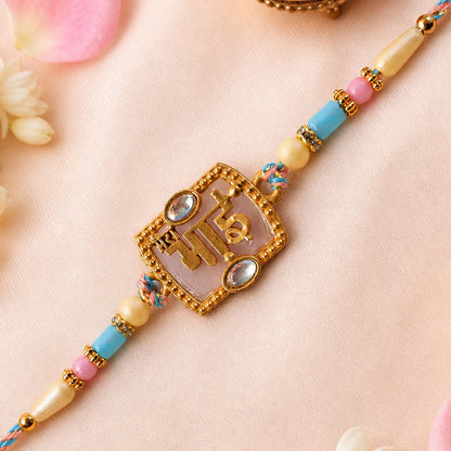 Bhai Script Pendant Rakhi with Lilac Stone and Kundan Accents