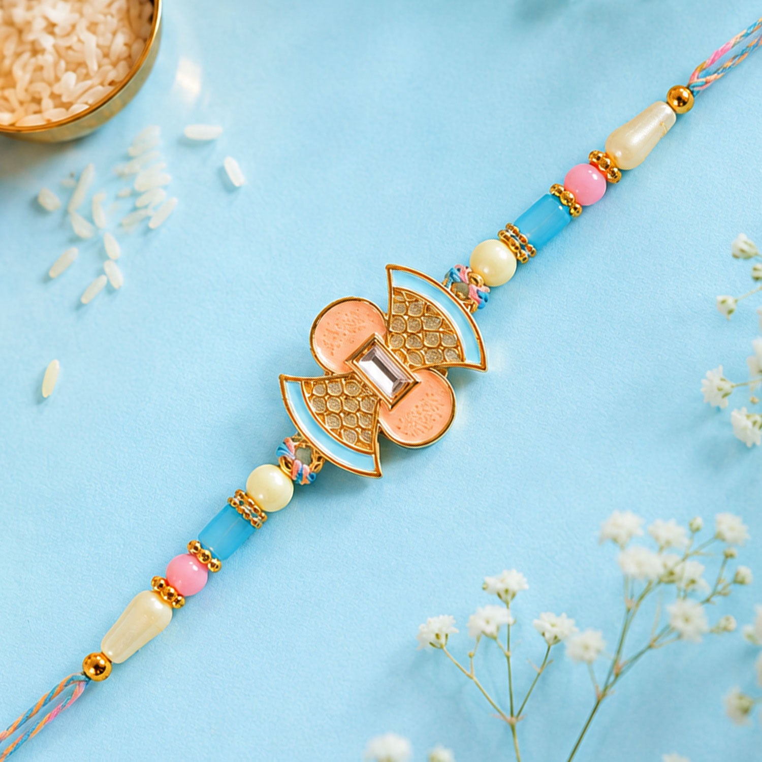 Fan Petal Kundan Pendant Rakhi with Pastel Beads