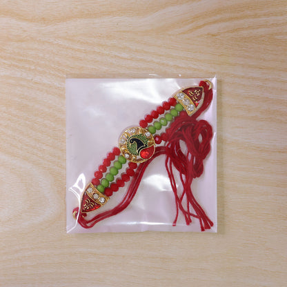 Red Green Beaded Rakhi with Gold Medallion and Bright Traditional Festive Gift Style