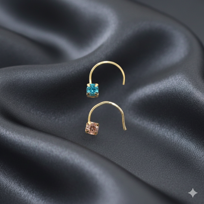 Gold plated solitaire crystal nosepin with Teal Blue crystal in secure prong setting
