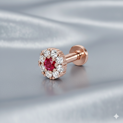 Rose gold ruby halo nose pin featuring a genuine ruby center surrounded by white diamond halo