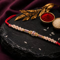 Pearl Stone Rakhi with Colourful Thread for Raksha Bandhan