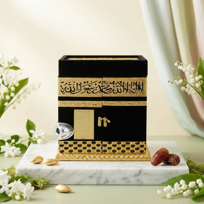 Close-up of gold-plated Arabic calligraphy on velvet Kaaba replica