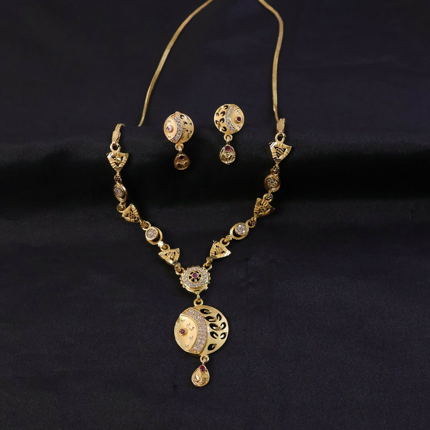 Elegant traditional jewelry set with beaded pendant and earrings