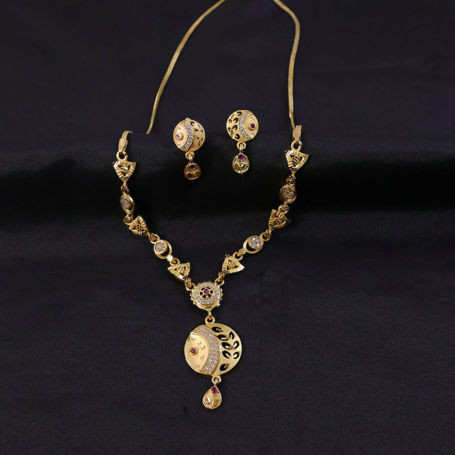 Elegant traditional jewelry set with beaded pendant and earrings