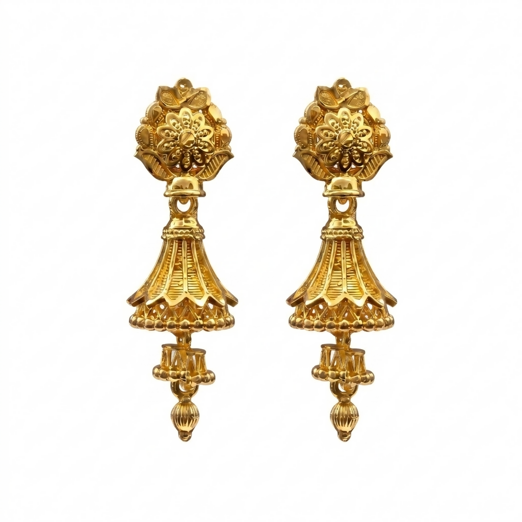 Model wearing traditional gold jhumki earrings