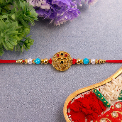 Side view of Golden Shri Ram Rakhi with blue beads