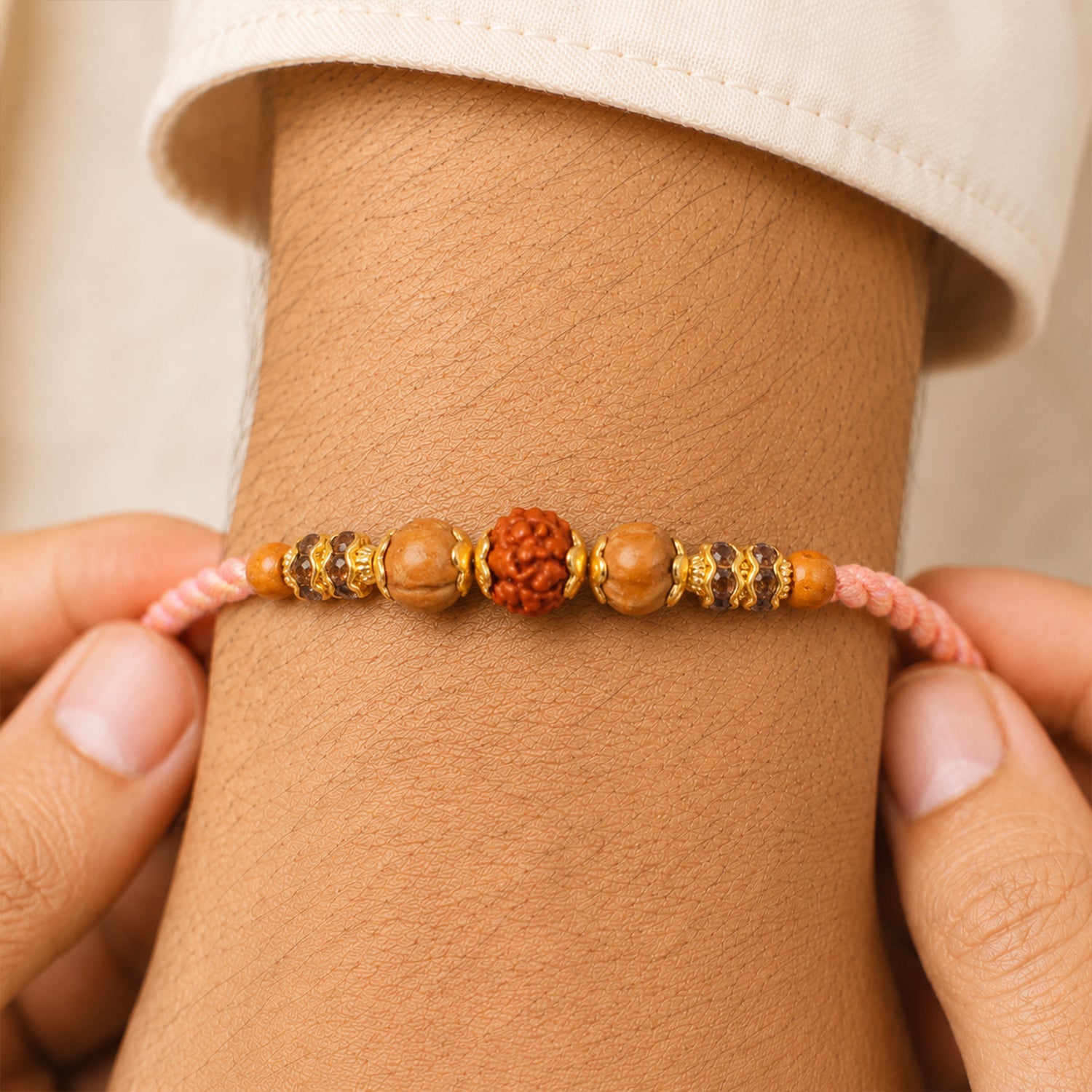 Beautiful Silver Style Rakhi with Soft Beads, Stone Detail and Premium Festive Look
