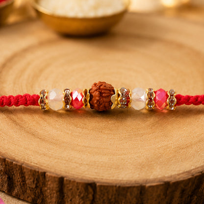 Stone Studded Designer Rakhi with Traditional Beads and Beautiful Festive Finish