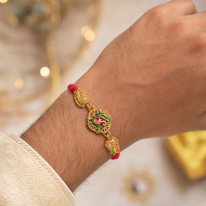 Premium Rakhi showcasing Floral Medallion, crystal accents and chain look for Gift