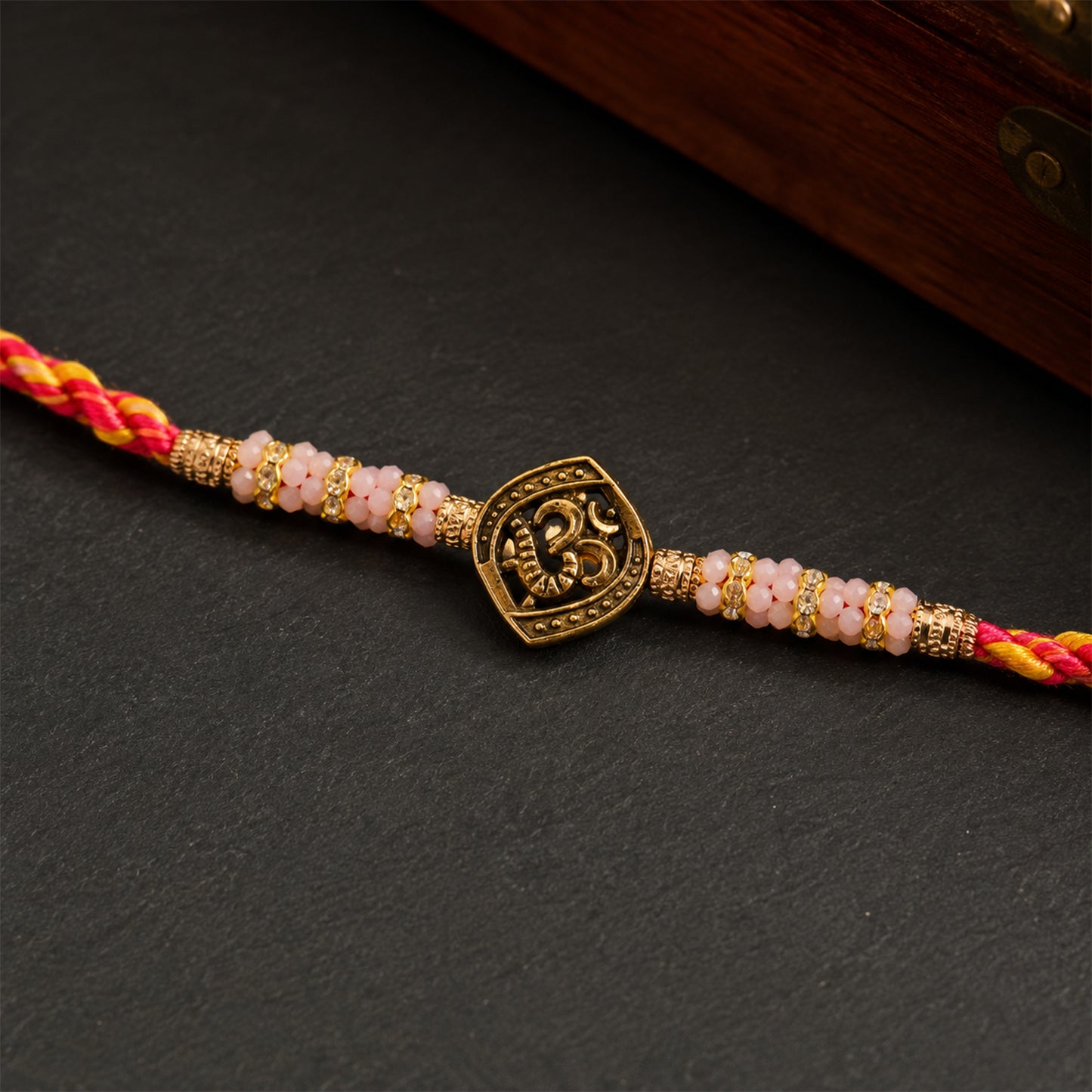 Silver Tone Designer Rakhi with Pastel Beads and Elegant Bracelet Style Finish