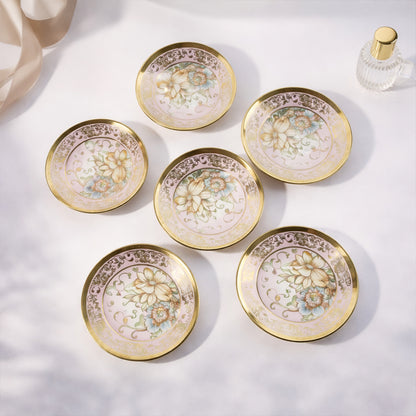 Porcelain tea cups with saucers