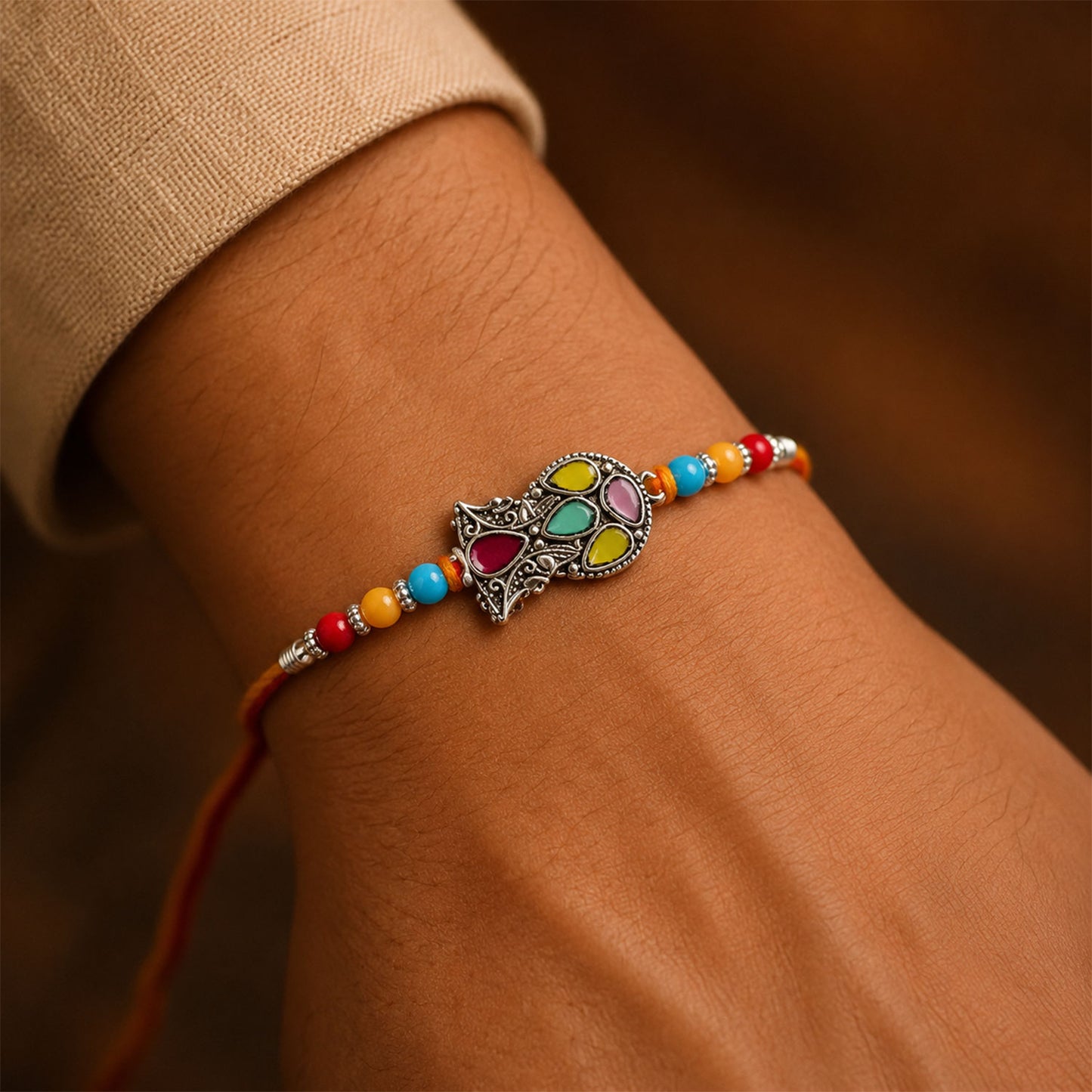 Multicolor Teardrop Leaf Rakhi with Orange Thread, Roli Chawal Coin and Gift Box Packing