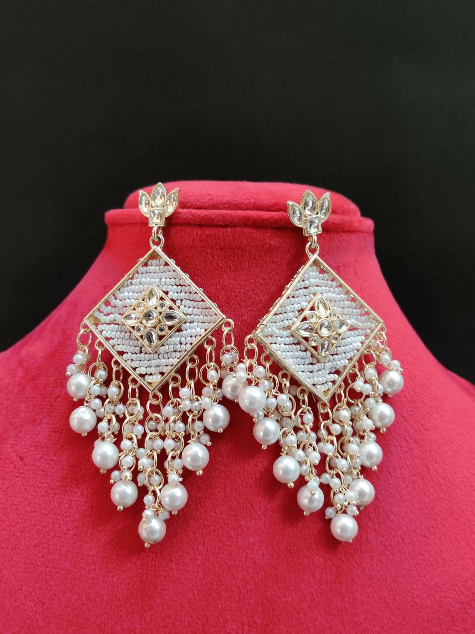Elegant Silver-Toned Kundan Chandelier Earrings with Traditional Pearl Jhumka Drops