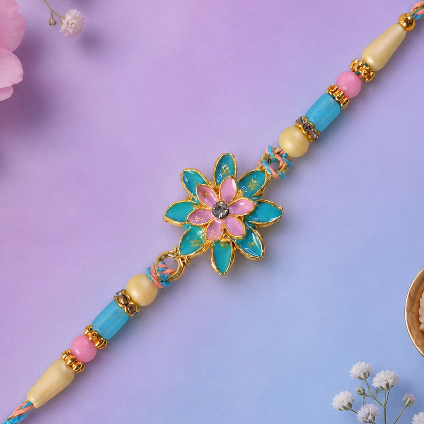 Designer Rakhi featuring Lotus Charm, bead line and gift style for Retail Display