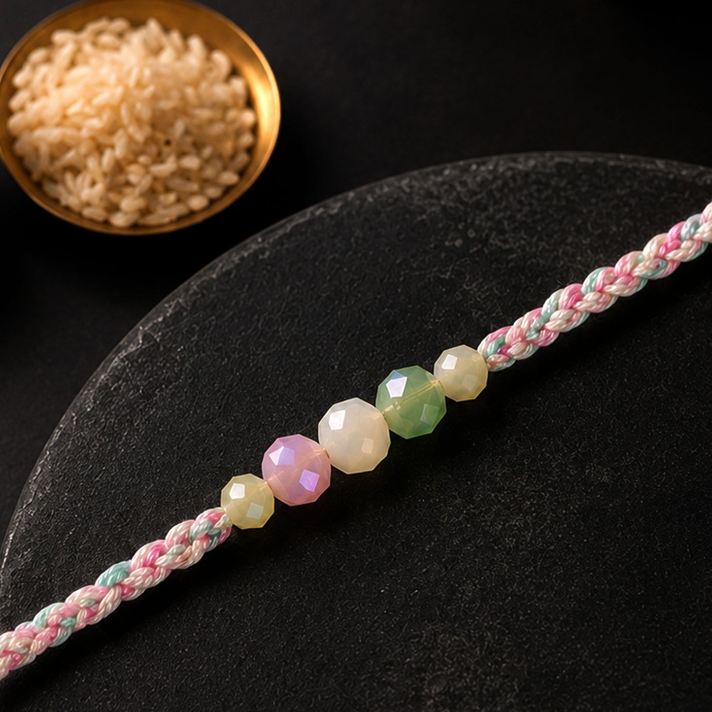 Pastel Pearl Bracelet Rakhi with Soft Pink Green Beads and Delicate Designer Beauty