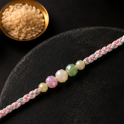 Pastel Pearl Bracelet Rakhi with Soft Pink Green Beads and Delicate Designer Beauty