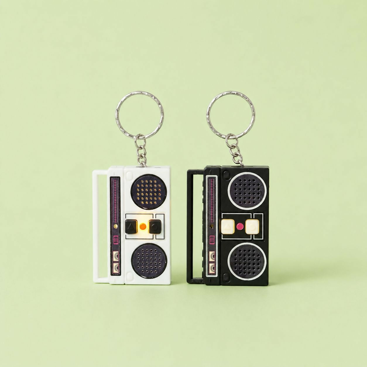 Mini voice recorder keychain showing side view with buttons
