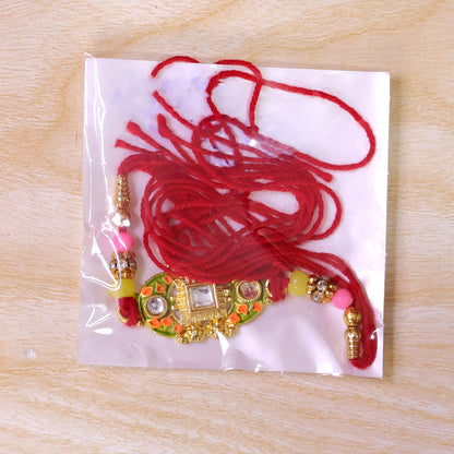 Elegant Rakhi with Square Red Gem Charm and gift finish in ornate look for Gift Use