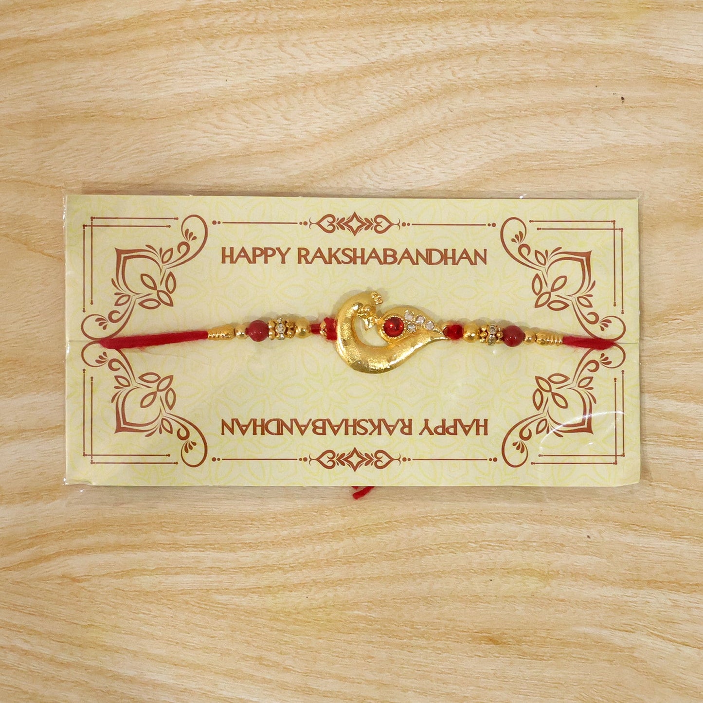 Peacock Feather Rakhi, Golden & Kundan Detailed Red Thread (10pcs)
