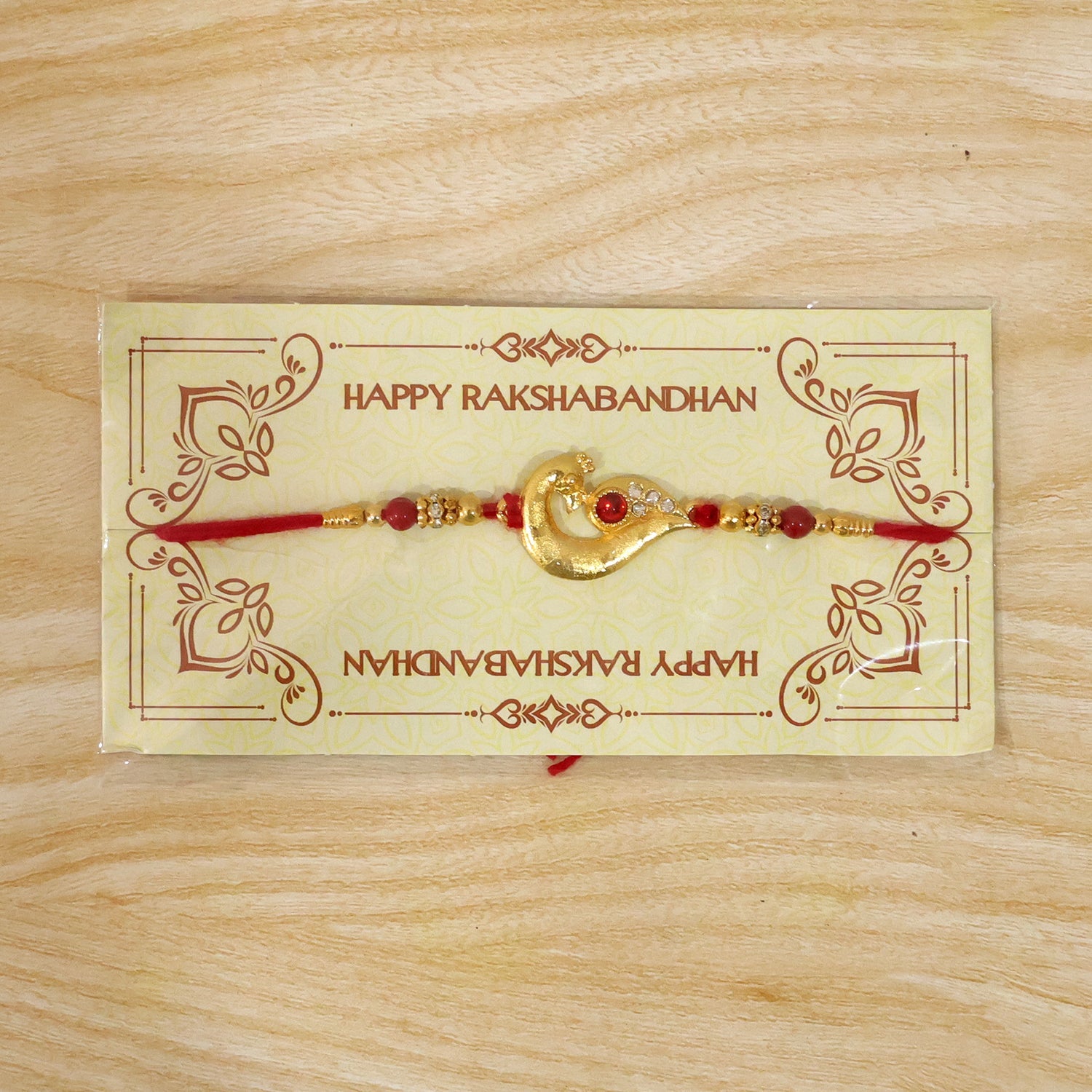 Peacock Feather Rakhi, Golden & Kundan Detailed Red Thread (10pcs)