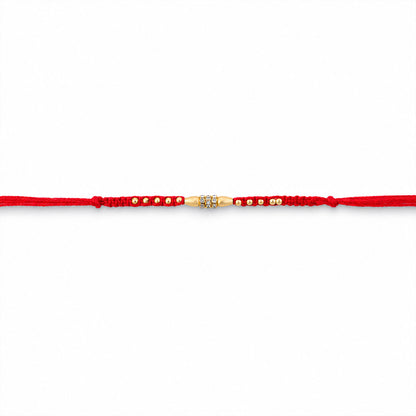 Minimal Red Thread Rakhi with Small Golden Bead Pendant Accents
