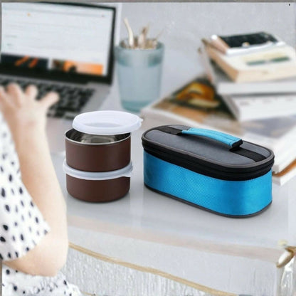 Stylish stainless steel lunch box packed with healthy food inside