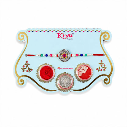 Sunburst Stone Rakhi with Magenta Centre, Pearl Beads, Roli Chawal Coin and Card Packing