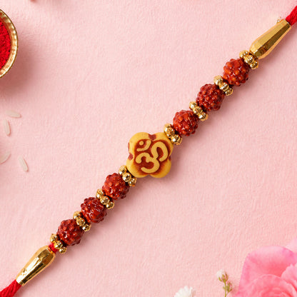 Om Bead Rakhi with Red Brown Accents and Spiritual Festive Brother Gift Styling Ideas