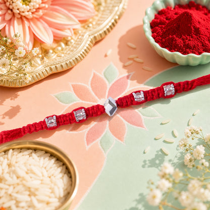 Red Thread Rakhi with Silver Square Beads and Diamond-Shaped Charm
