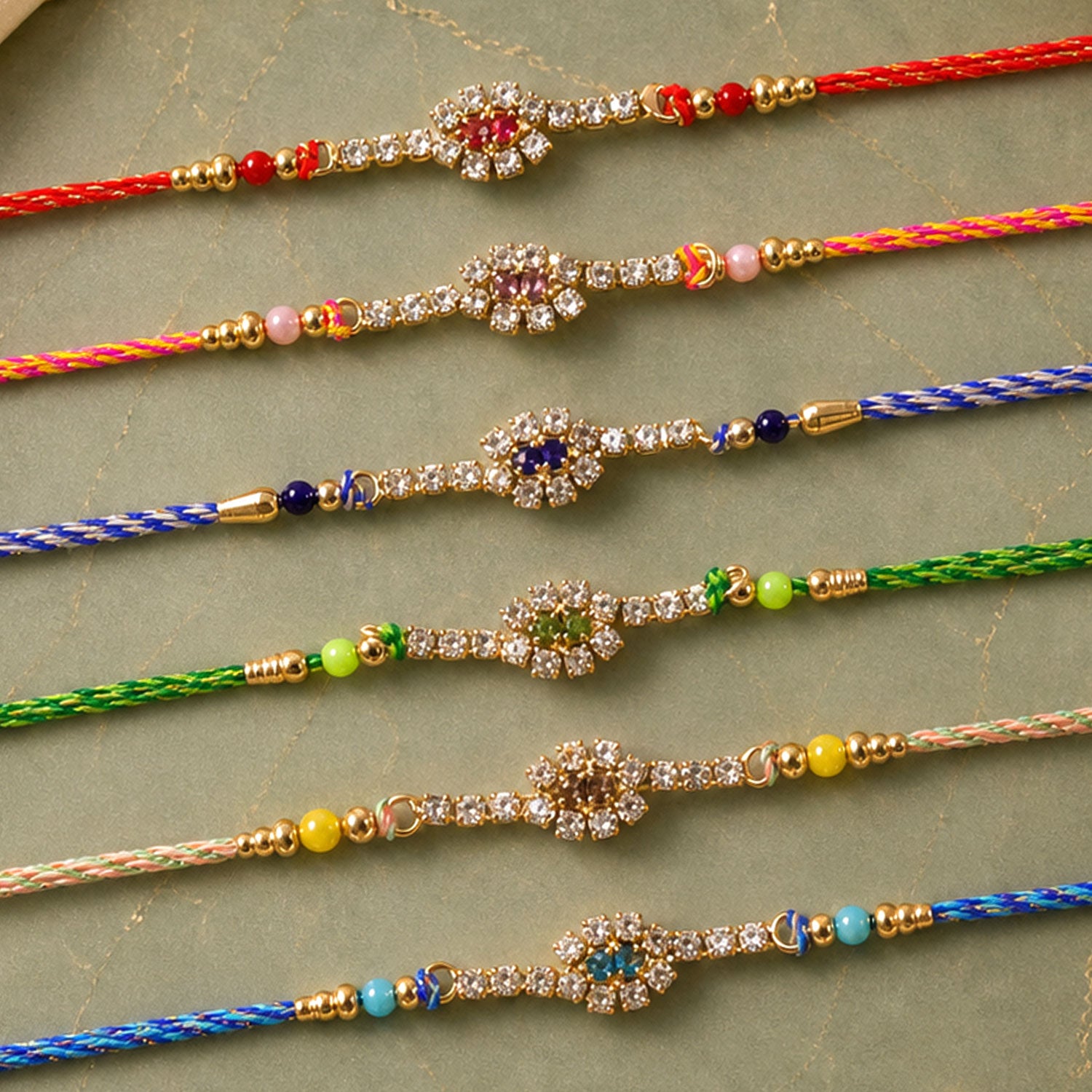 Slim Oval Motif Rakhi with Delicate AD Sparkle (Pack of 6)