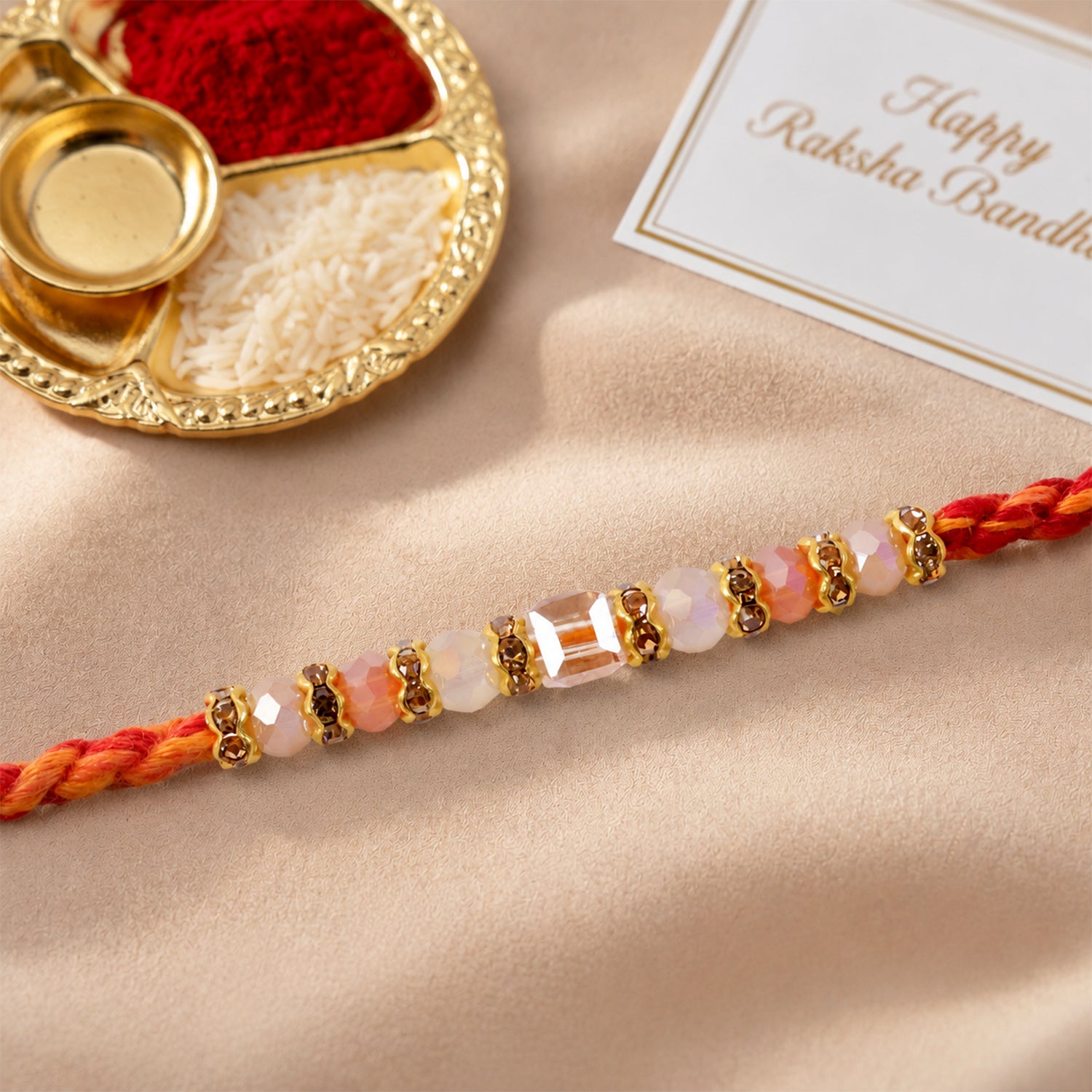 Silver Tone Designer Rakhi with Pastel Beads and Elegant Bracelet Style Finish