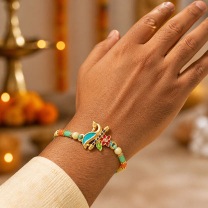 Teal Peacock Enamel Pendant Rakhi with Kundan Flower Accent