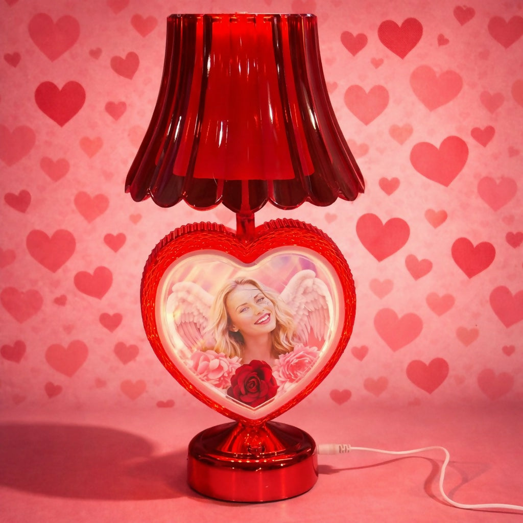 Close-up of heart-shaped illuminated photo display lamp