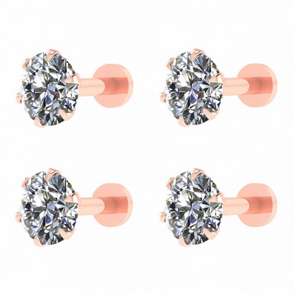 Close-up of rose gold nose stud showing flat-back labret post and sparkling cubic zirconia