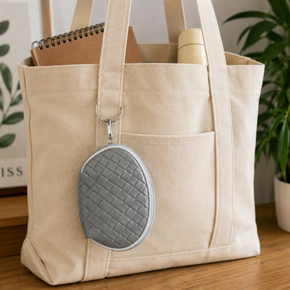 Compact mini coin pouch showing woven texture
