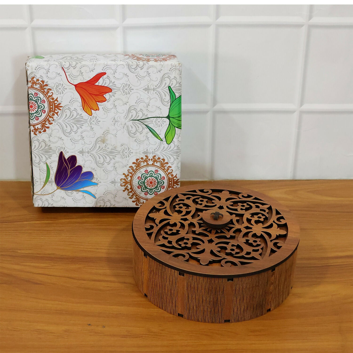 Dry fruit storage box placed on dining table enhancing festive home décor
