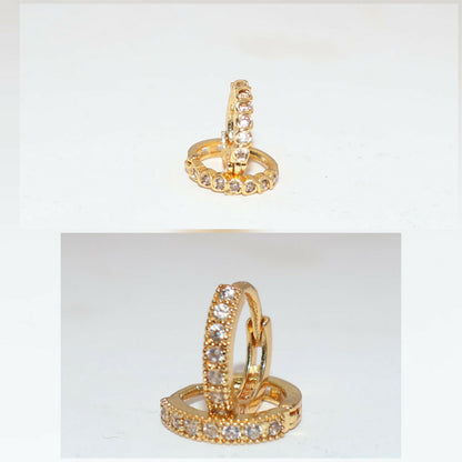 Side view of elegant gold plated huggie hoop earrings with dangle design and hinged closure