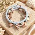 Handcrafted Sea Shell Baloya Bangle with Off-White Beads & Metallic Spiral Cuff Style