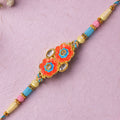 Ornate Rakhi with Butterfly Bloom Charm, multicolor stones and bead line for Gift Use